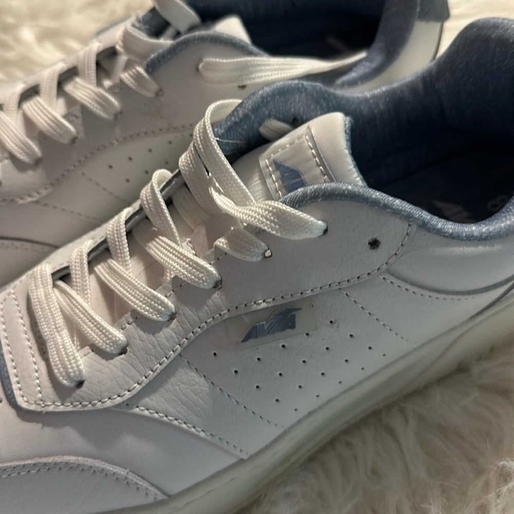 White leather never worn. Just tried on walked through house but were too big